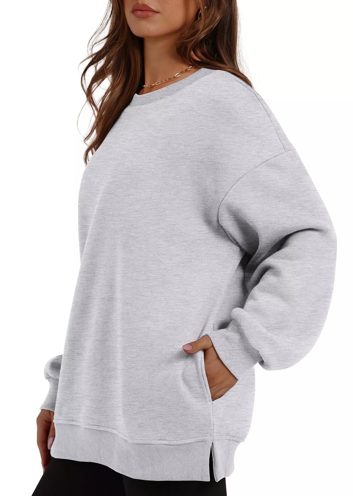 Light gray casual long sleeve sweatshirt with relaxed fit and ribbed cuffs and hem.