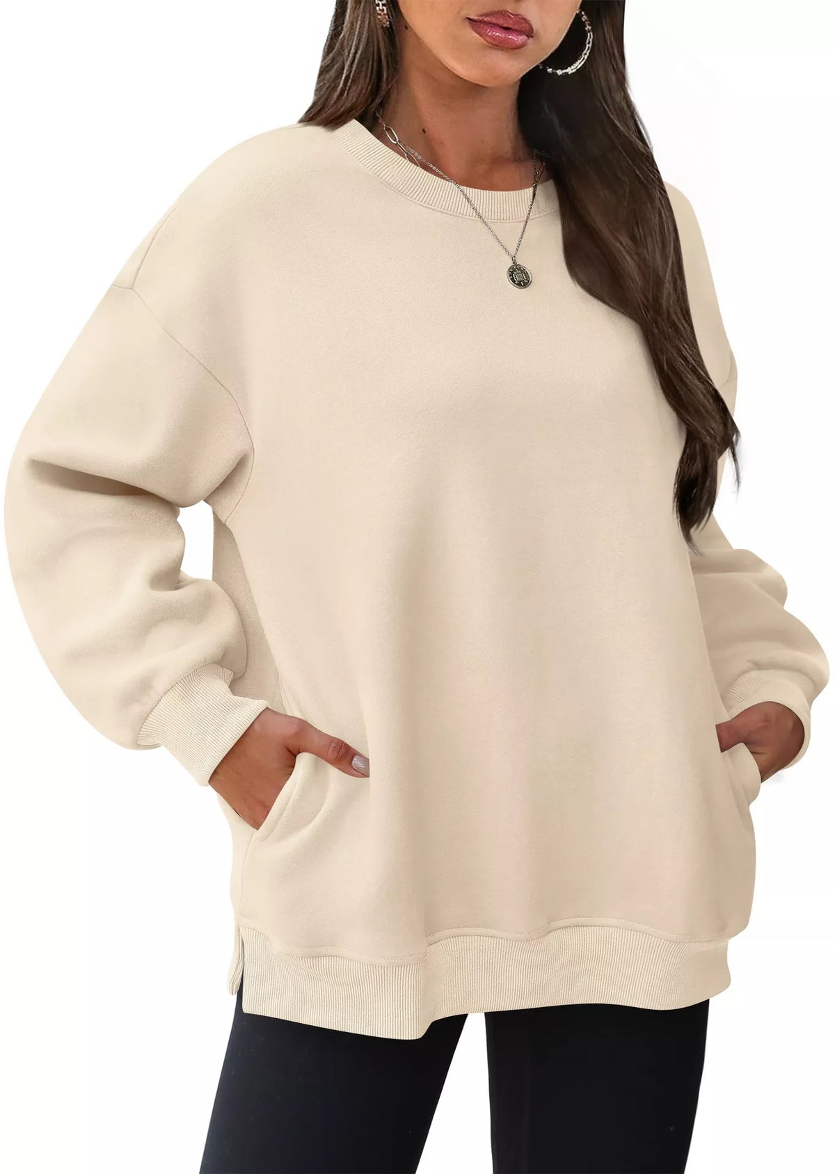 Cream-colored casual long sleeve sweatshirt with relaxed fit and ribbed cuffs.