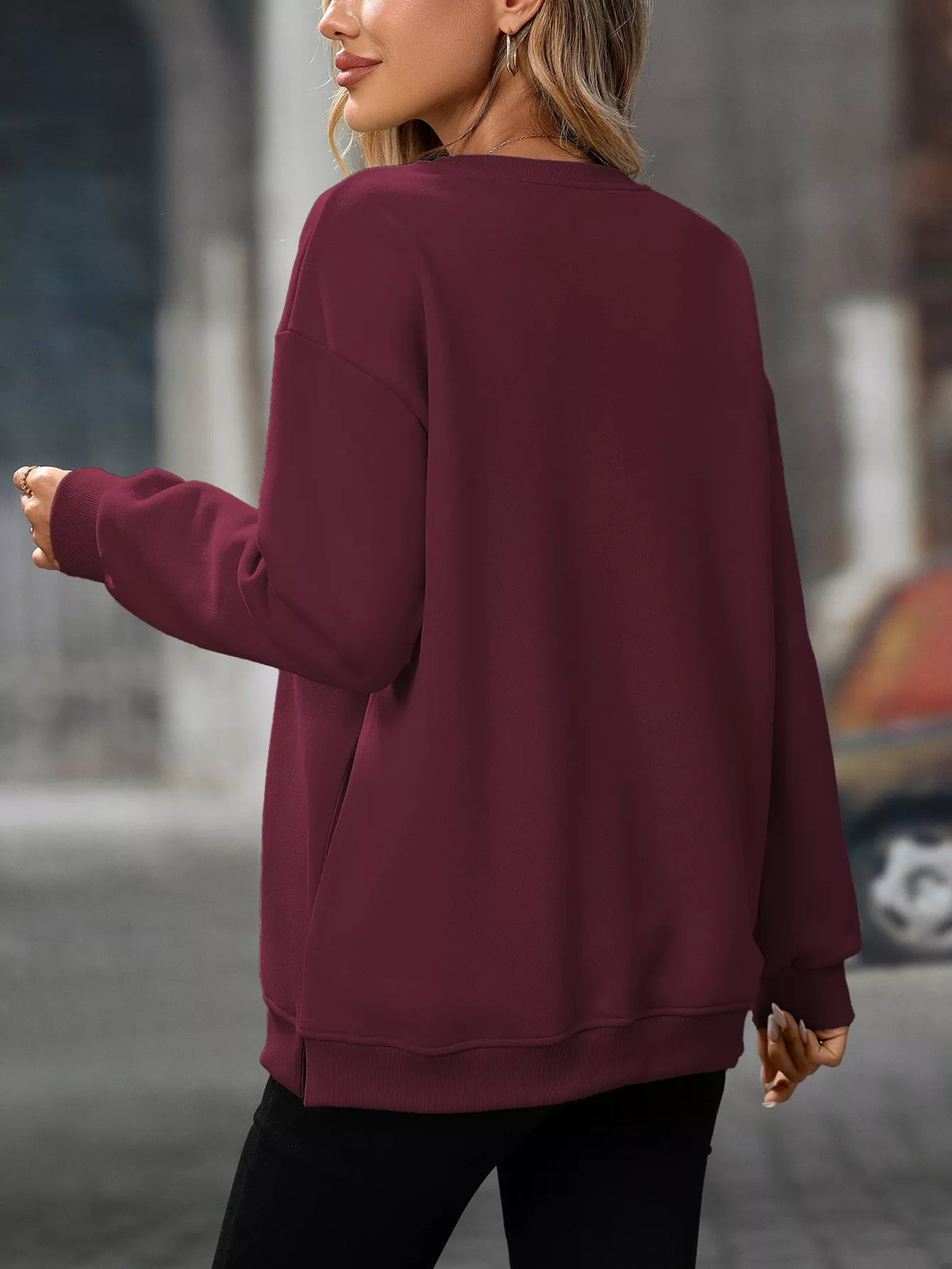 Burgundy long sleeve casual sweatshirt with relaxed fit and ribbed cuffs and hem.