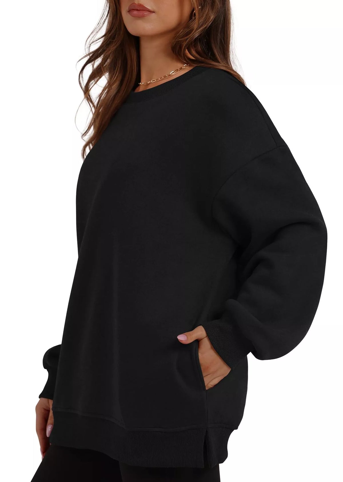 Black casual long sleeve sweatshirt with relaxed fit and side pockets worn by a model.