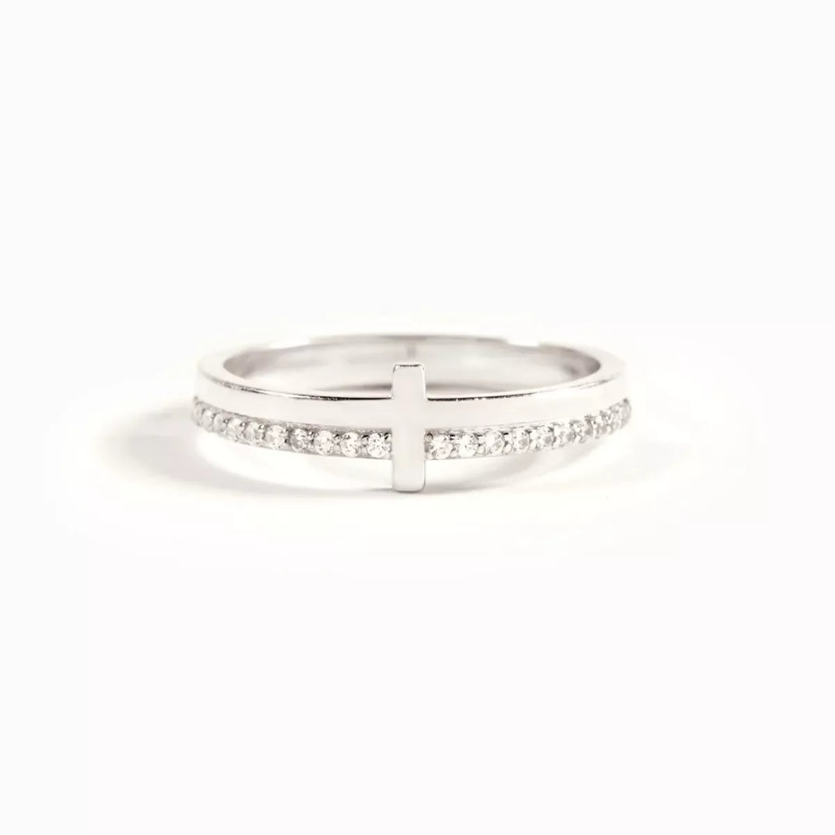 925 sterling silver ring with a polished cross and a row of small sparkling stones.
