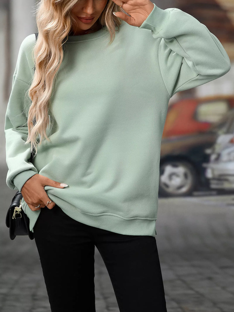 Gum Leaf green casual long sleeve sweatshirt with relaxed fit and ribbed cuffs and hem.