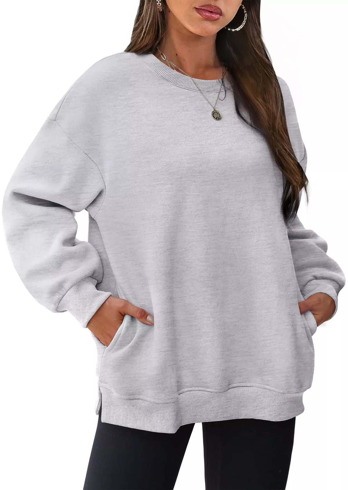 Light gray casual long sleeve sweatshirt with ribbed cuffs and hem, relaxed fit.